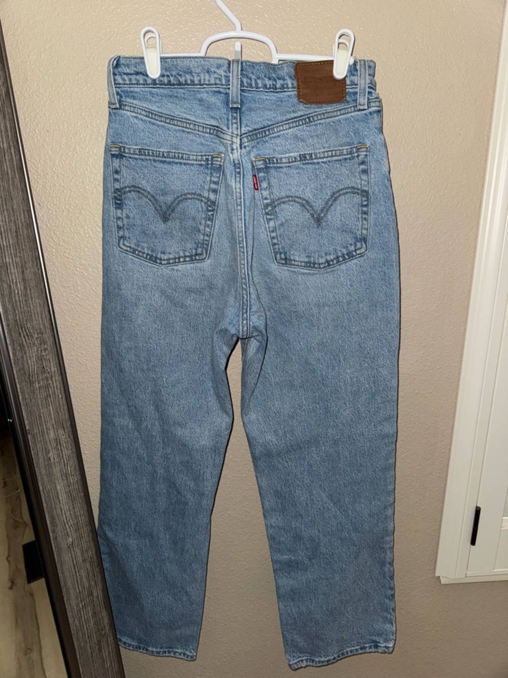 Levi Ribcage Straight ankle. High-Rise Light Blue Distressed Women’s Jeans